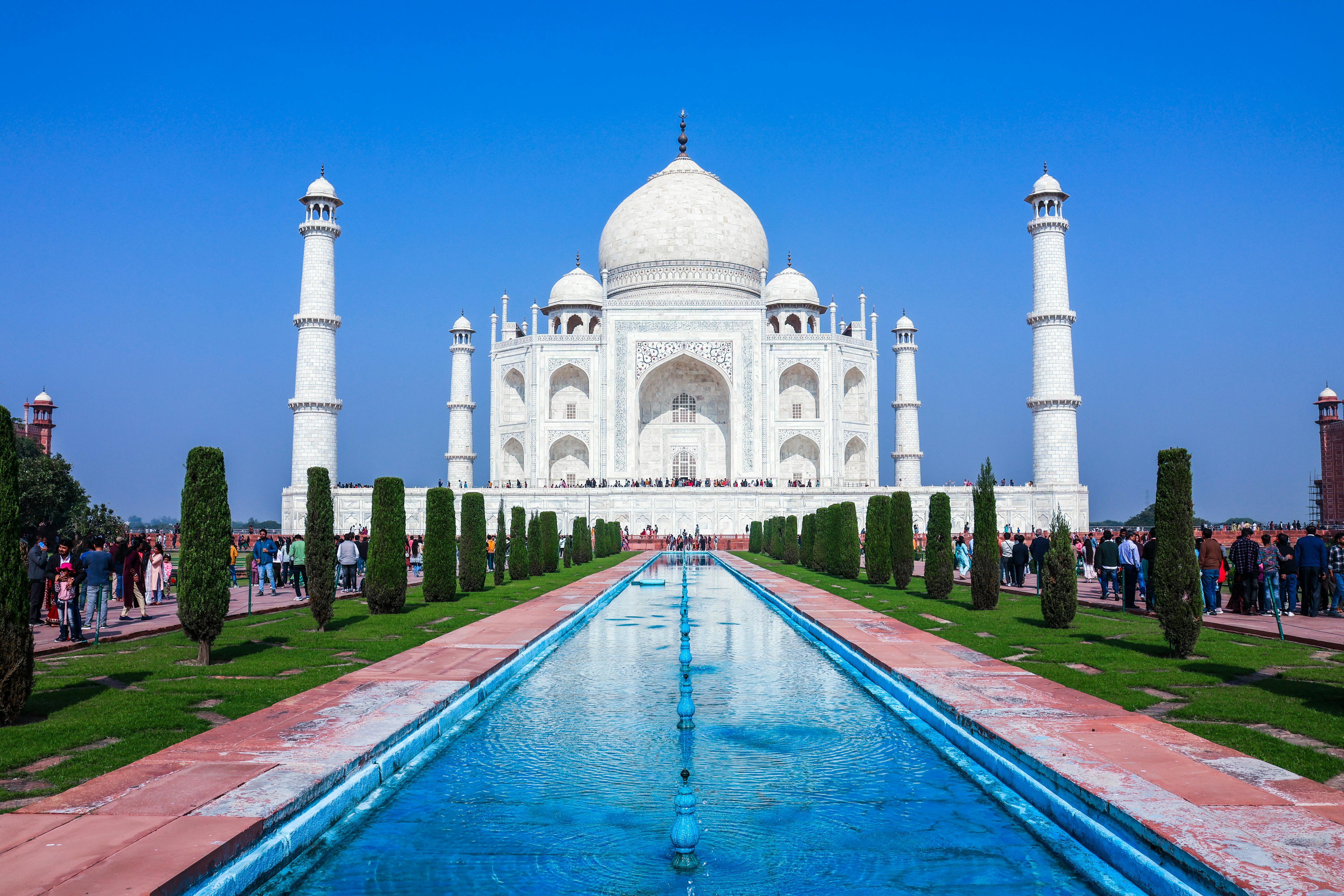 The Taj Mahal reflected in the water of its central garden.