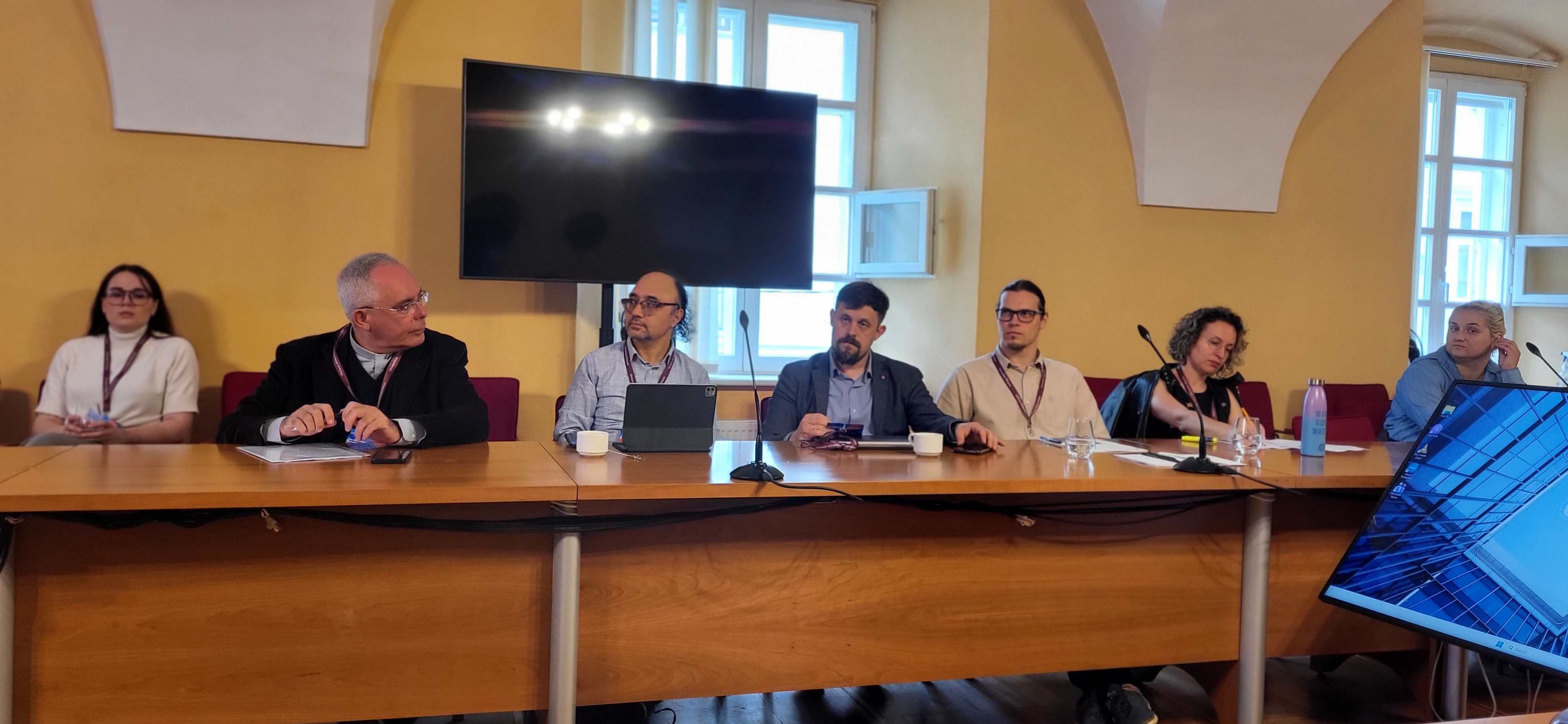 Panel discussion featuring multiple scholars